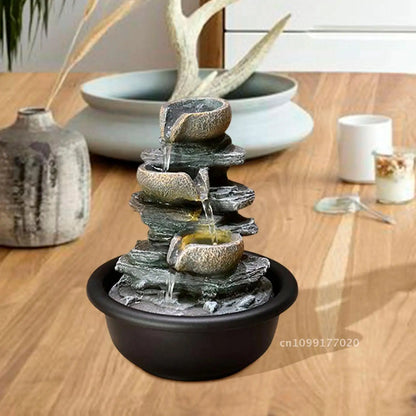Nutshell indoor tabletop water fountain with cascading stone bowls and black base for home decor