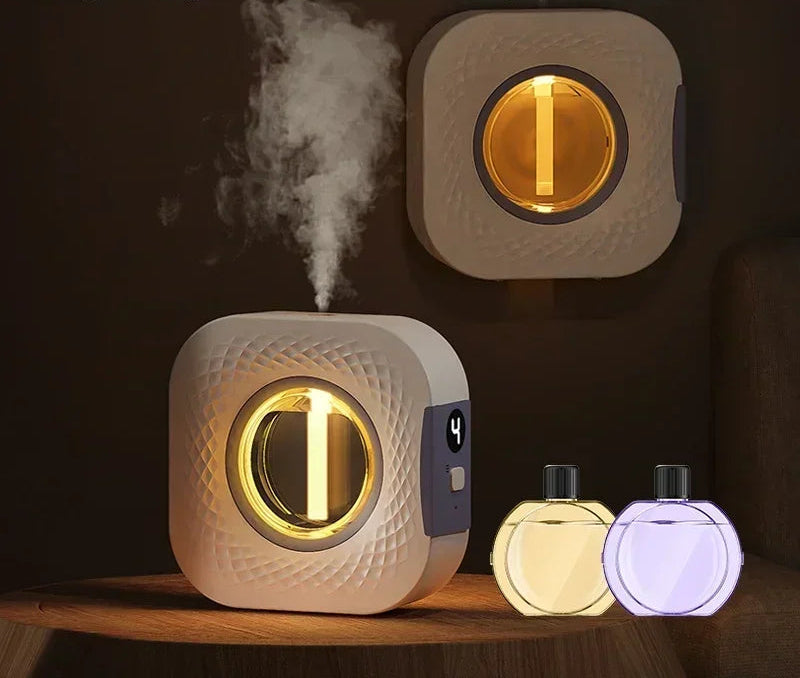 Nutshell desktop aroma diffuser with night light function releasing vapor and two round fragrance bottles