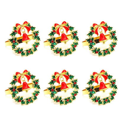 Christmas napkin rings set featuring gold bells and Christmas wreath design for festive table decor
