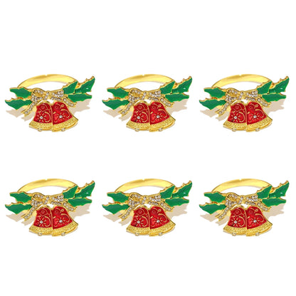 Elegant Christmas napkin rings set featuring golden bells and holly leaves for festive table decor