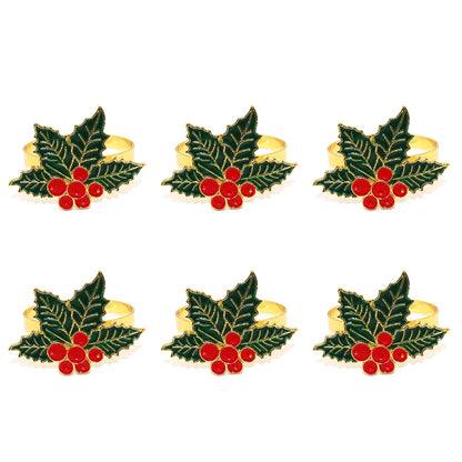 Christmas napkin rings set featuring holly leaves and red berries for festive dining decor