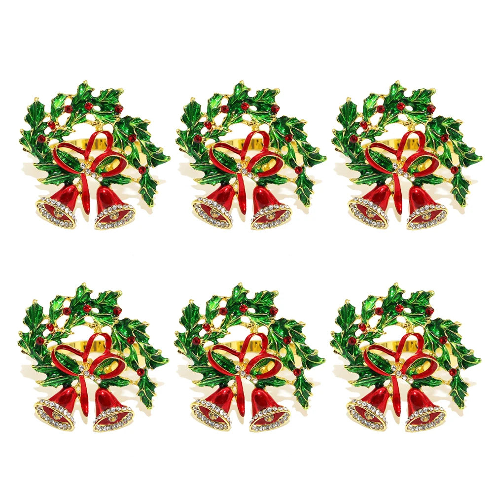 Set of six decorative Christmas napkin rings featuring bells and holly leaves for festive table settings