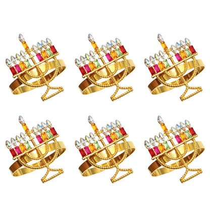 Set of six festive Christmas napkin rings set with colorful embellishments for holiday table decor