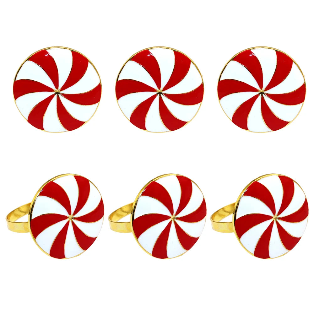 Christmas napkin rings set featuring red and white peppermint swirl design for festive table settings