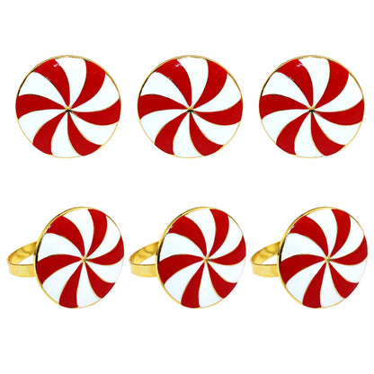 Christmas napkin rings set featuring red and white peppermint swirl design for festive table settings