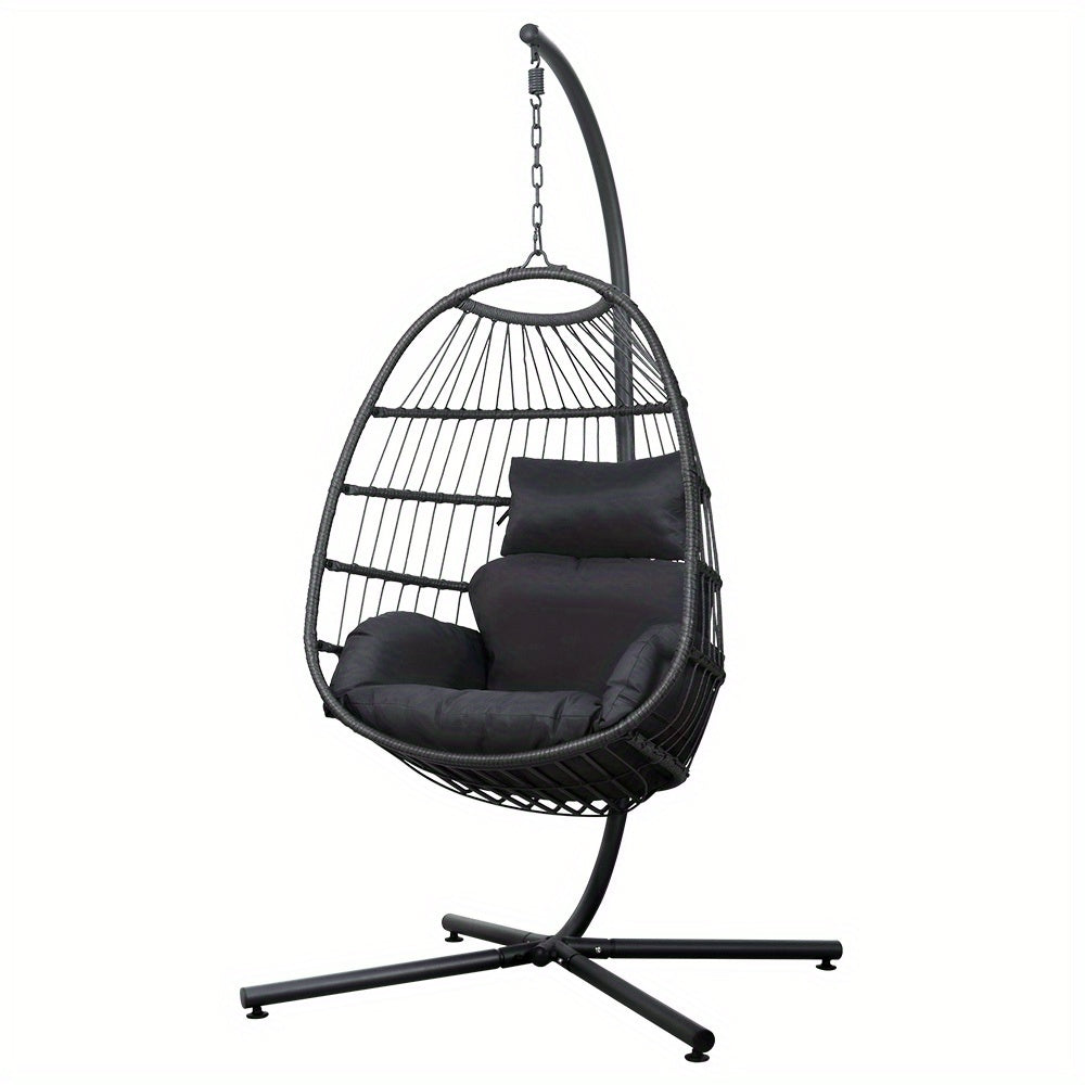Black egg swing chair with stand featuring comfortable cushioned seating and sturdy metal frame