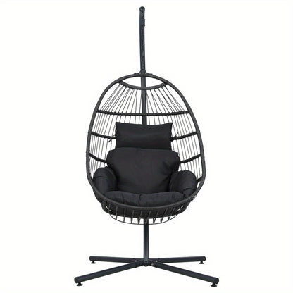 Nutshell black egg swing chair with stand featuring cushioned seating and pillow for indoor or outdoor use
