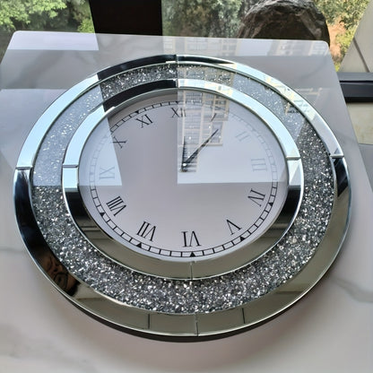 Nutshell elegant glass mirrored wall clock with Roman numerals and decorative crystal accents