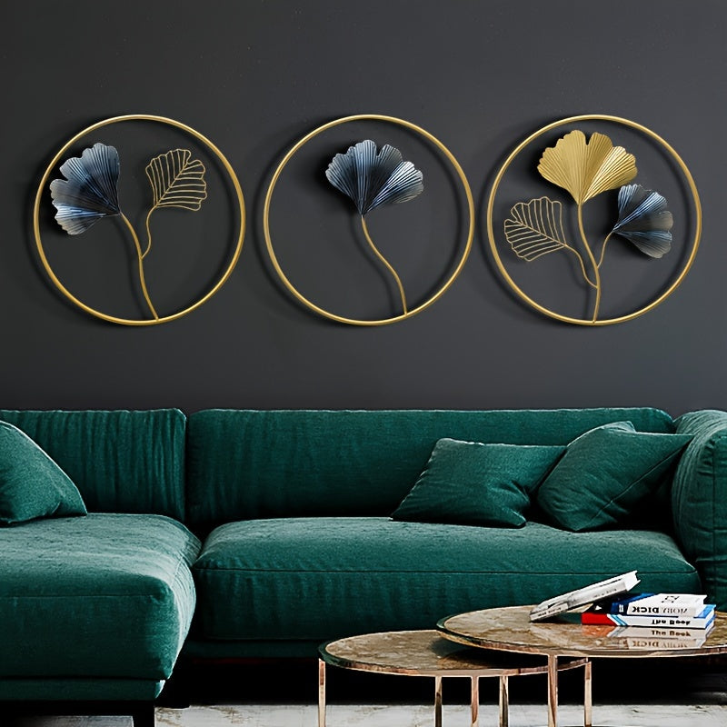 Set of three European style wall art pieces featuring floral designs in gold and blue against a dark wall