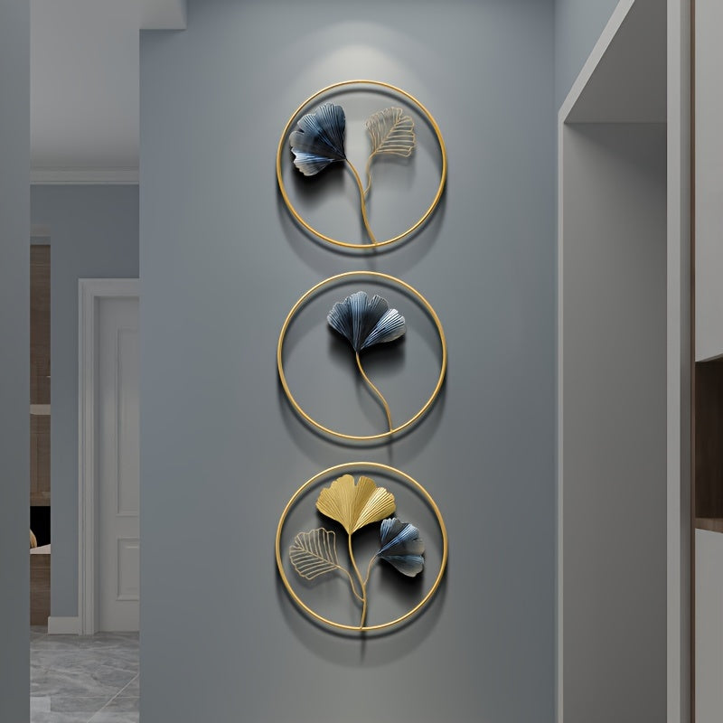 Elegant European style wall art featuring three floral designs in gold and blue frames