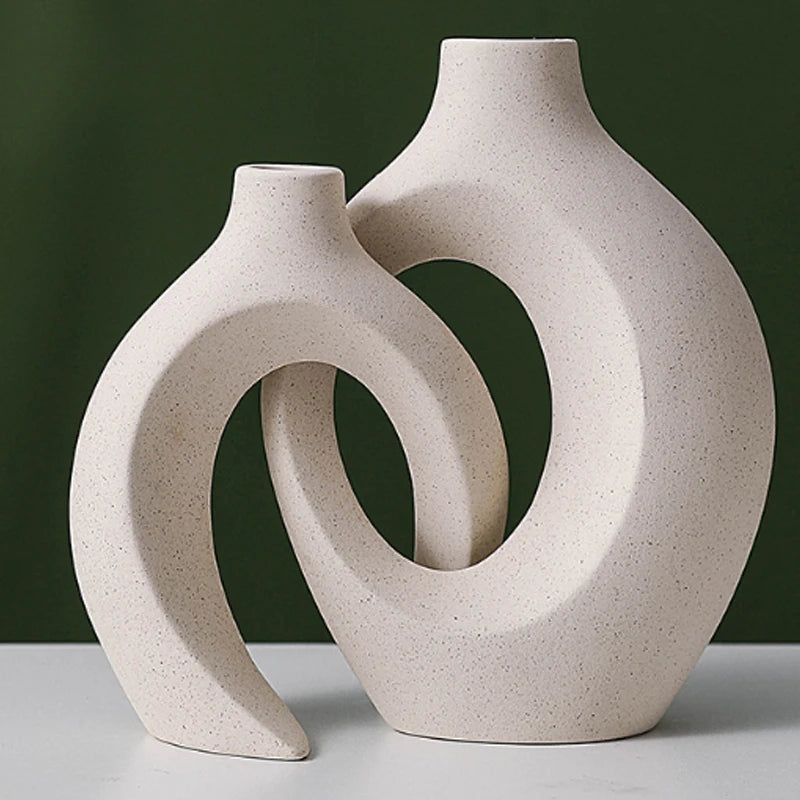 European style white plastic vase set featuring unique curved designs for modern decor