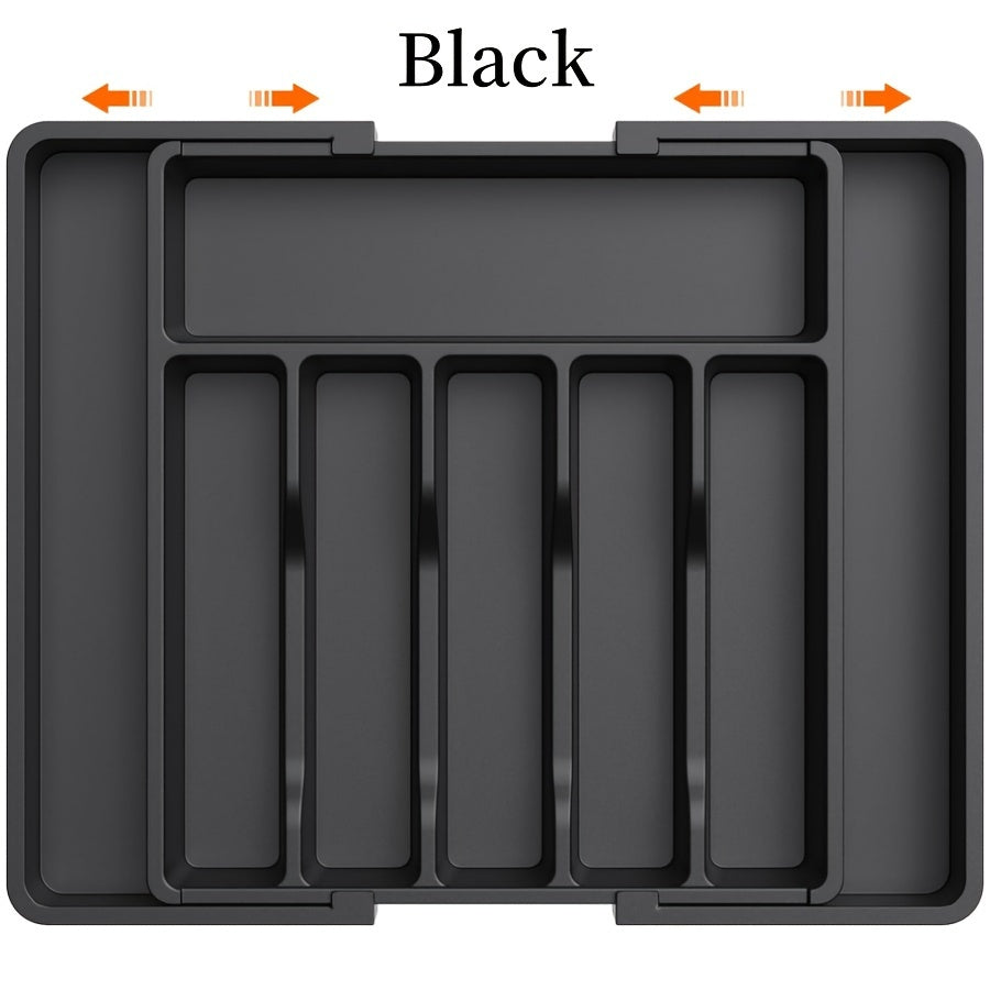 Nutshell expandable cutlery tray in black with customizable compartments for efficient kitchen organization