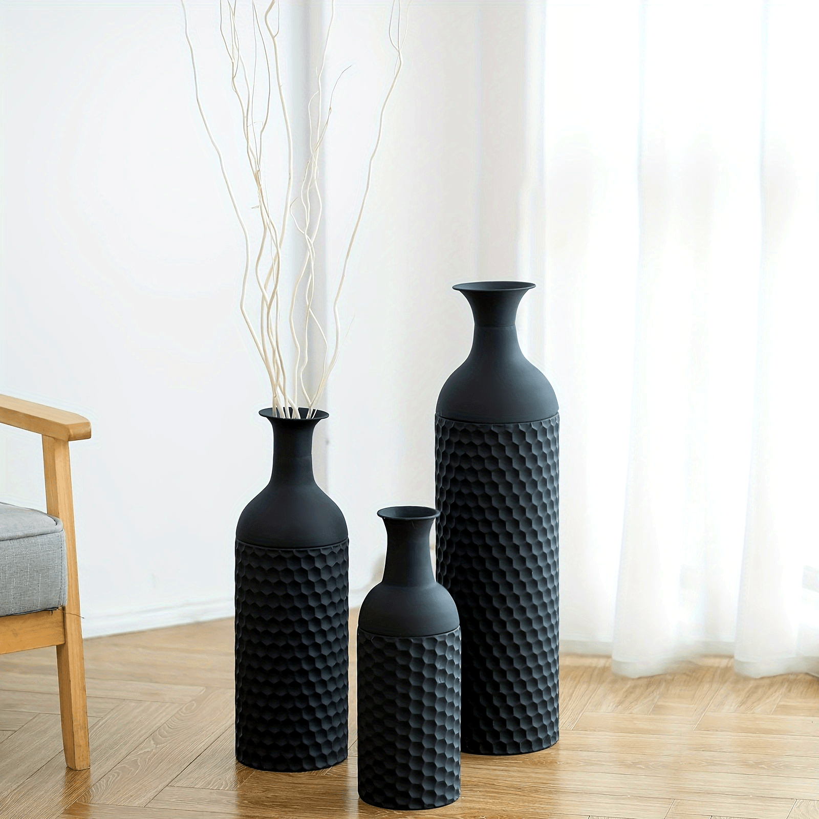 Set of three extra large metal floor vases in black with textured designs for home decor