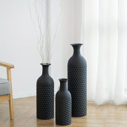 Set of three extra large metal floor vases in black with textured patterns, perfect for modern decor