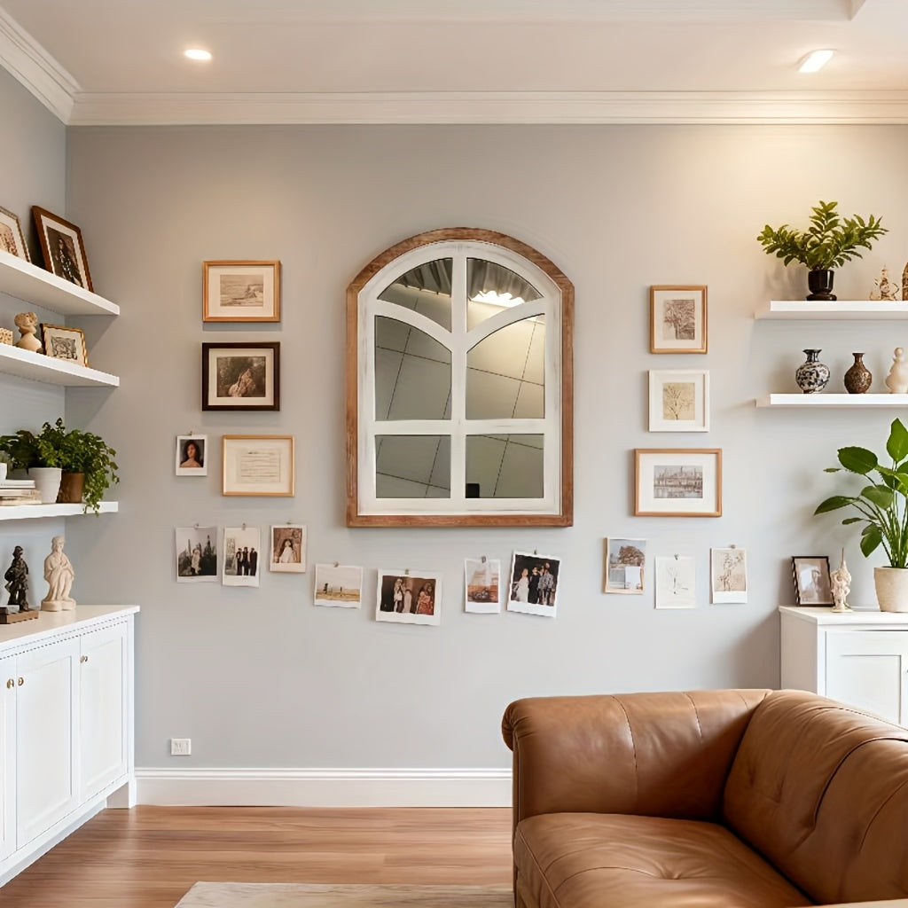 Nutshell farmhouse arched mirror set against a light gray wall in a modern living room
