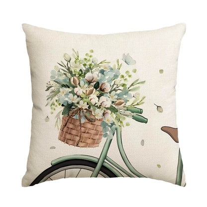 Nutshell farmhouse eucalyptus pillow covers featuring a bike basket with flowers on a cream cushion