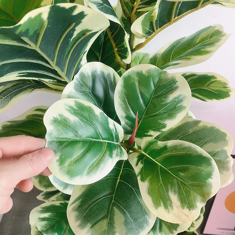 Nutshell faux plant real touch banyan tree with variegated green and cream leaves hand touching leaf