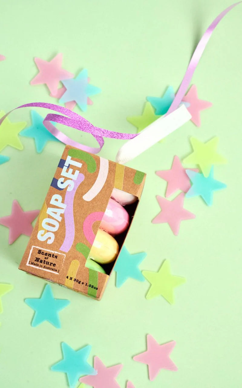 Nutshell Festive Soap Decoration Set in a colorful box with assorted shaped soaps and decorative stars