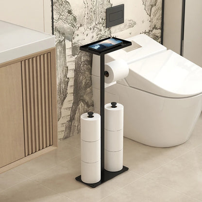 Modern floor standing toilet roll paper rack with sleek design, holding multiple rolls and a tablet holder