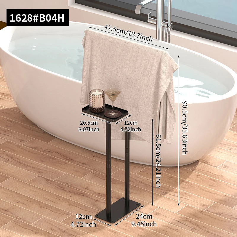 Floor standing towel rack with shelf in modern bathroom setting, featuring soft towel and decorative items