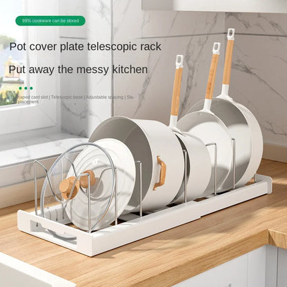 Nutshell foldable pot and lid organizer on kitchen counter, neatly displaying cookware and saving space