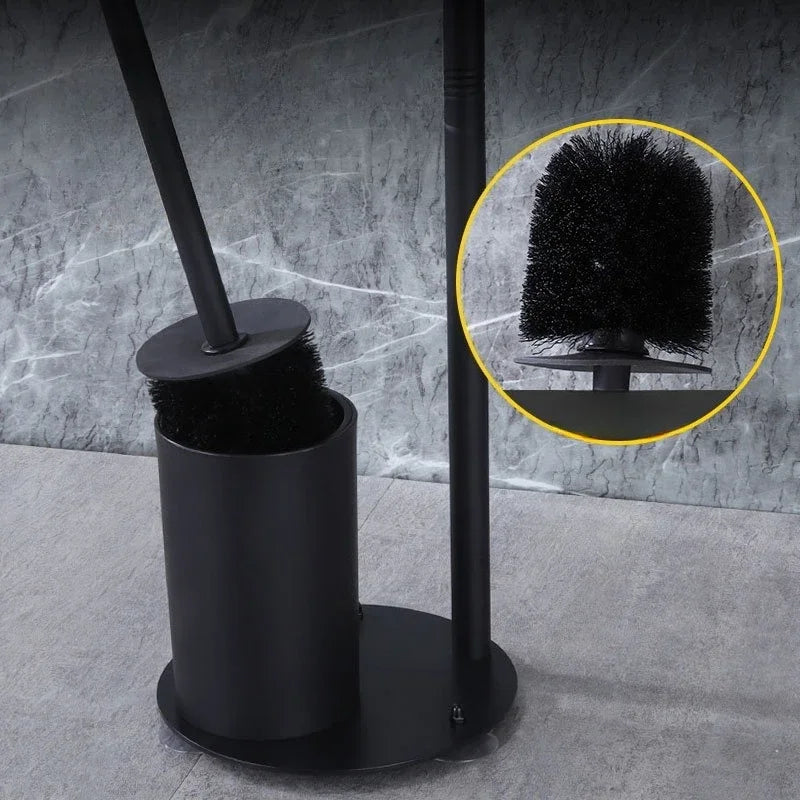 Nutshell freestanding toilet paper holder with brush featuring a sleek black design and modern look