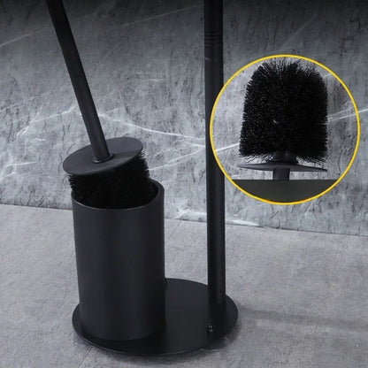 Nutshell freestanding toilet paper holder with brush featuring a sleek black design and modern look