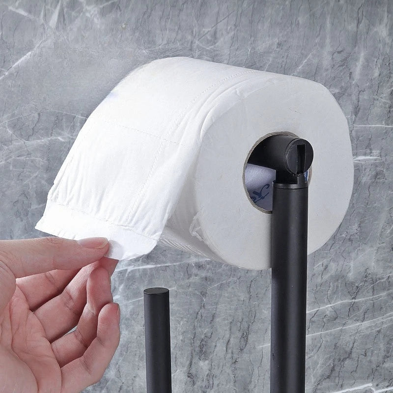 Nutshell freestanding toilet paper holder with brush in modern design for convenient bathroom organization