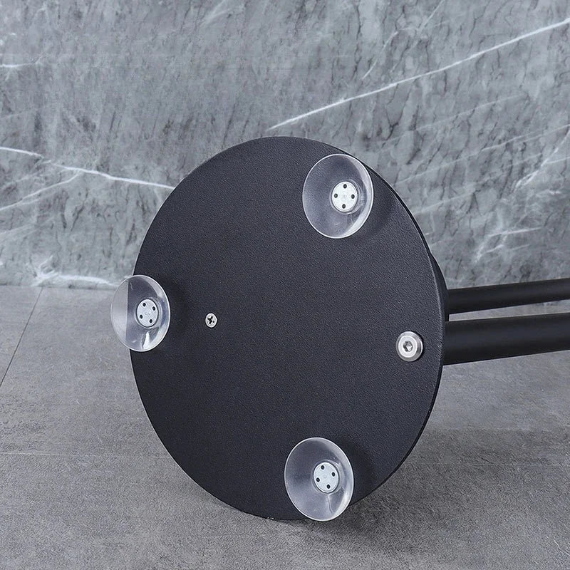 Base of Nutshell freestanding toilet paper holder with brush with sturdy suction cups for stability