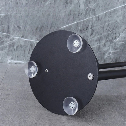 Base of Nutshell freestanding toilet paper holder with brush with sturdy suction cups for stability