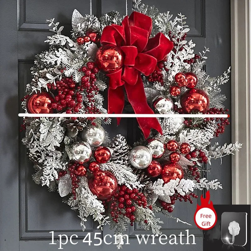 Front door Christmas garland decorations featuring a festive wreath with red and silver ornaments