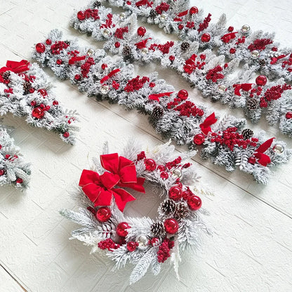 Nutshell front door Christmas garland decorations with red bows, pine cones, and festive ornaments