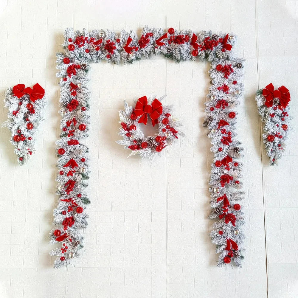 Front door Christmas garland decorations featuring red bows and festive accents for holiday cheer