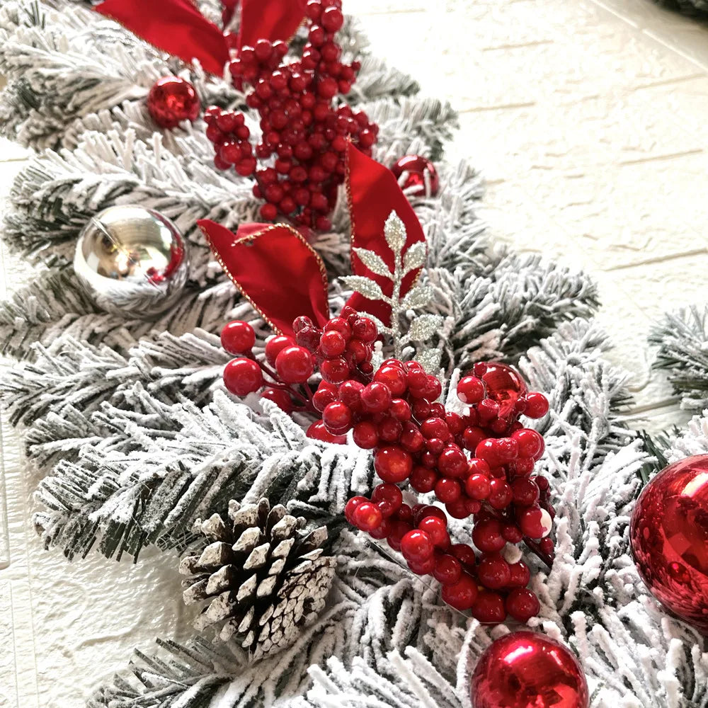 Nutshell front door Christmas garland decorations with red berries and festive accents