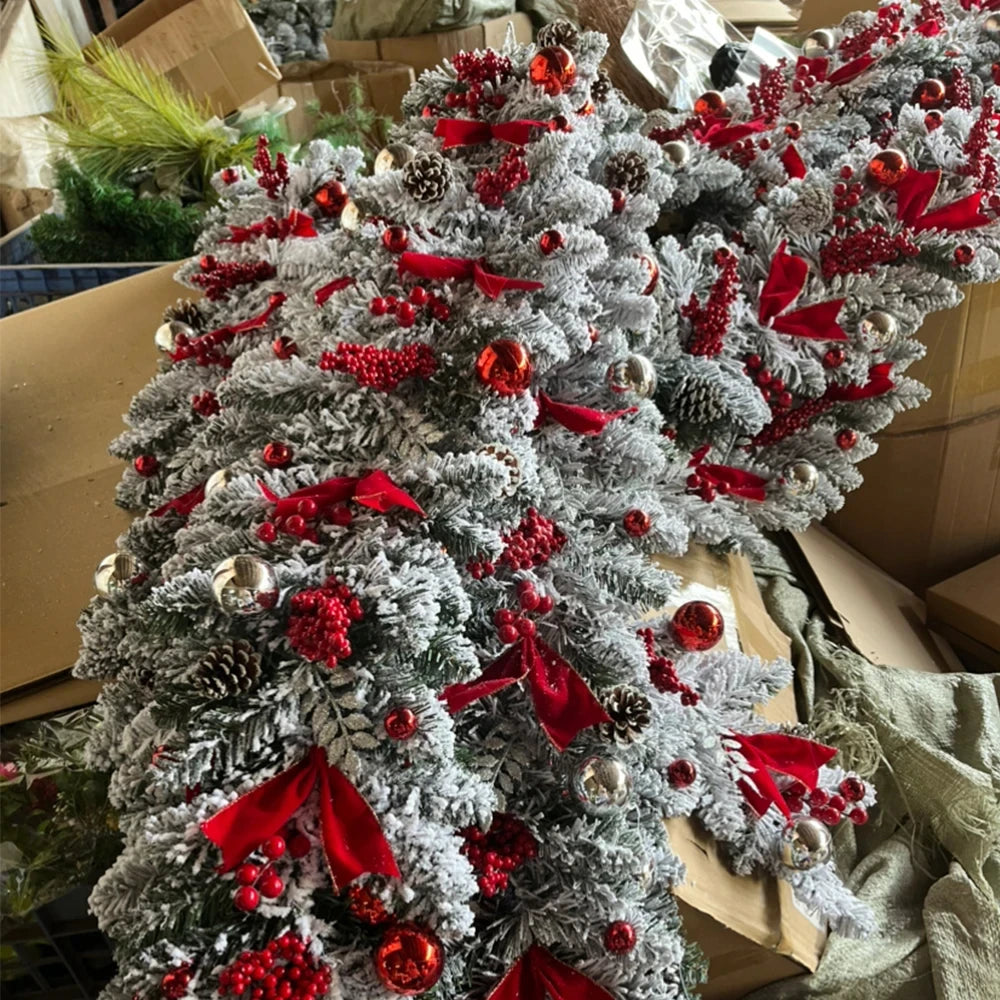 Nutshell front door Christmas garland decorations with pine cones, red bows, and shimmering ornaments