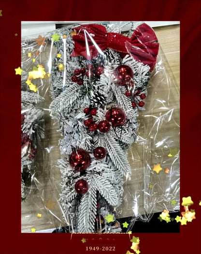 Nutshell front door Christmas garland decorations with red bow and festive ornaments