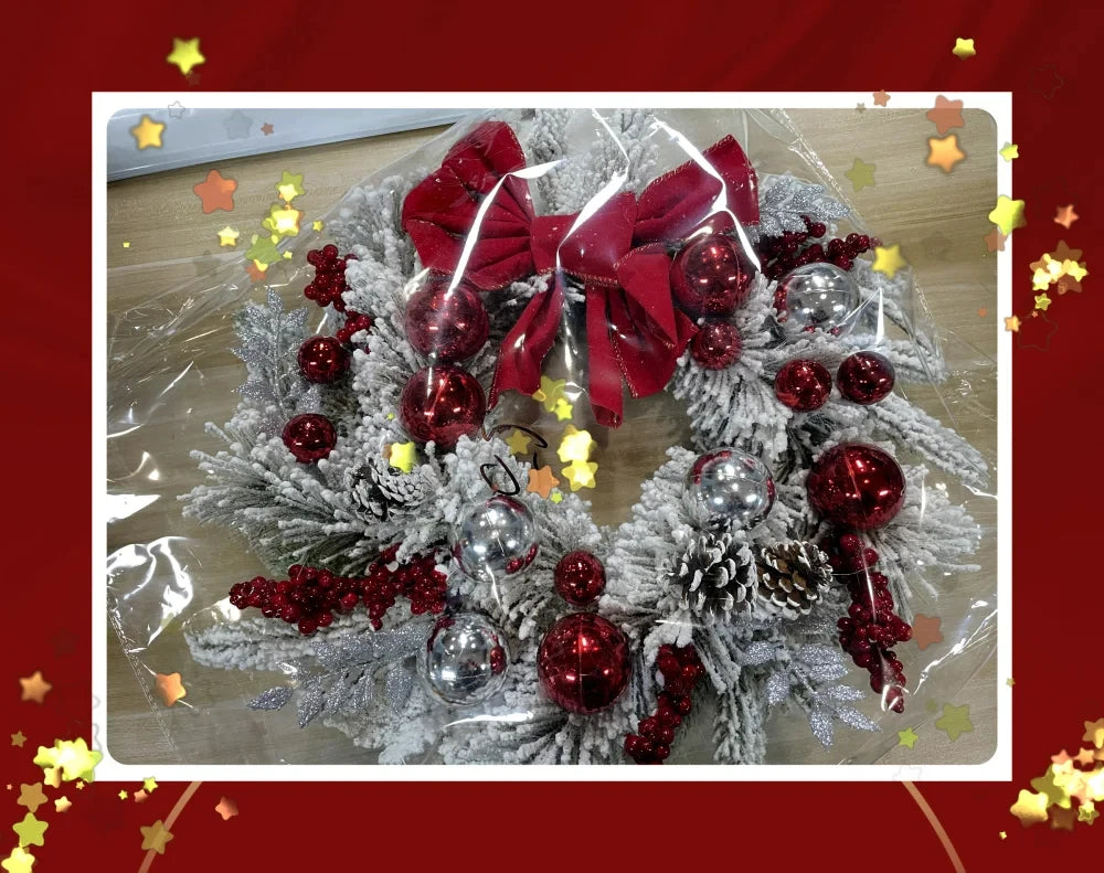 Front door Christmas garland decorations in red and silver with pinecones and festive details