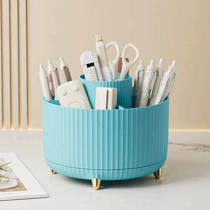 Nutshell bathroom organiser in blue with 360 degree rotating makeup organizer design holding scissors and pens