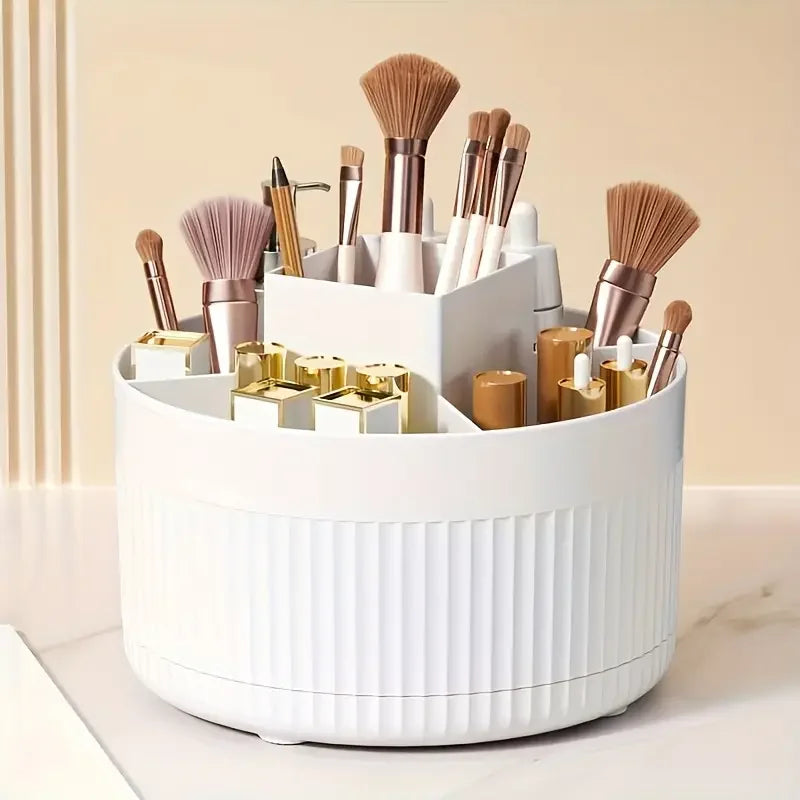 Nutshell 360 degree rotating makeup organizer in white holding makeup brushes and cosmetics