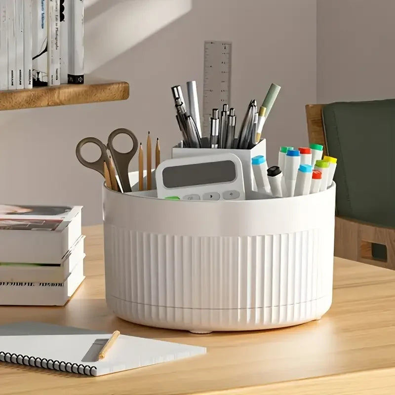 Nutshell 360 degree rotating makeup organizer in white holding pens scissors and markers on desk