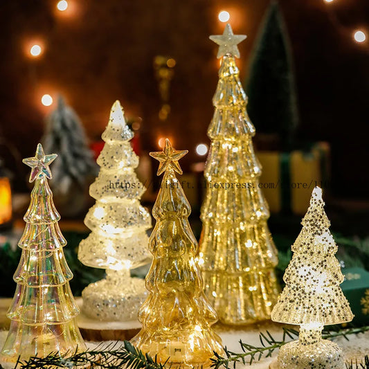 Assorted glass Christmas tree ornaments in various designs, sparkling with festive lights and stars