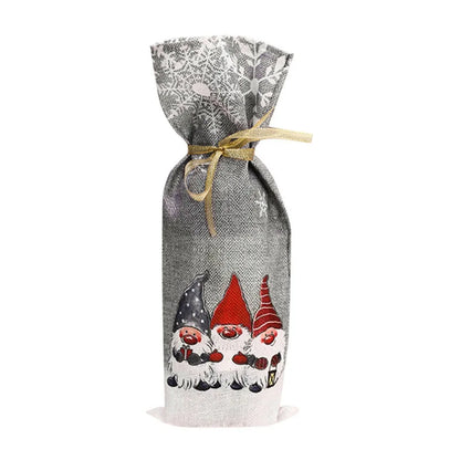 Gnome Christmas wine bottle cover featuring three cheerful gnomes with festive colors and a decorative tie