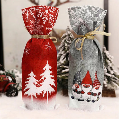 Gnome Christmas wine bottle cover in red and gray with festive snowflakes and gnome designs