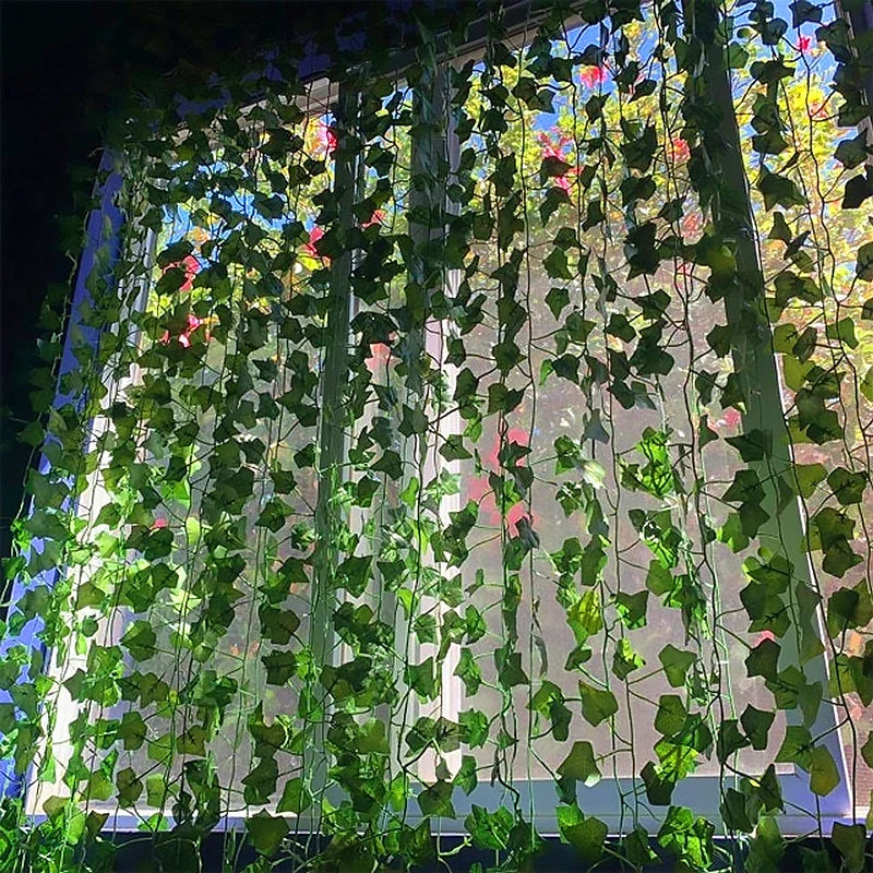Nutshell Artificial Green Ivy Leaf Rattan Creeper Vine hanging over sunlit window for indoor greenery decor
