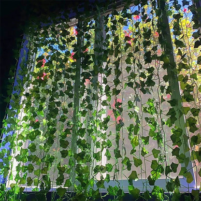 Nutshell Artificial Green Ivy Leaf Rattan Creeper Vine hanging over sunlit window for indoor greenery decor