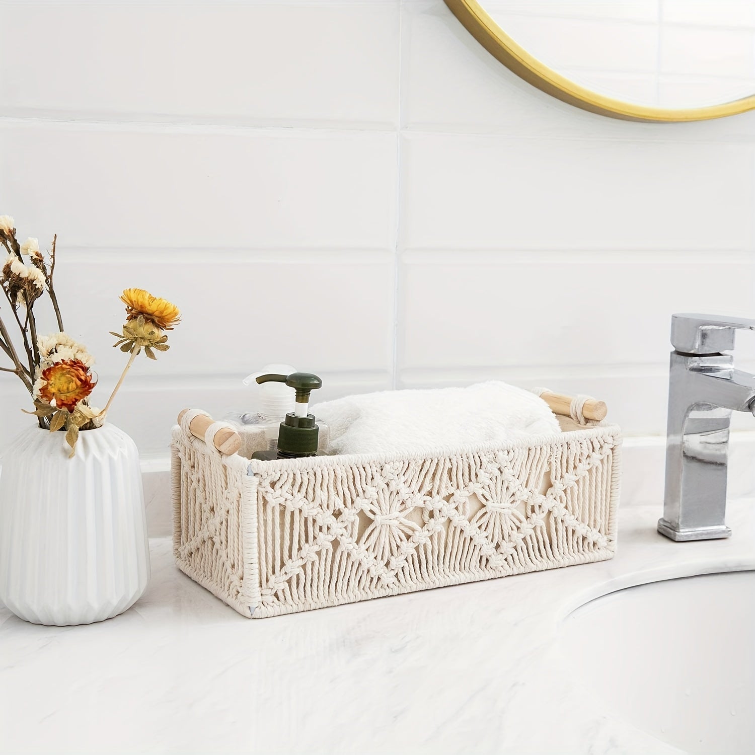 Handmade macrame storage baskets in a bathroom setting with towels and toiletries