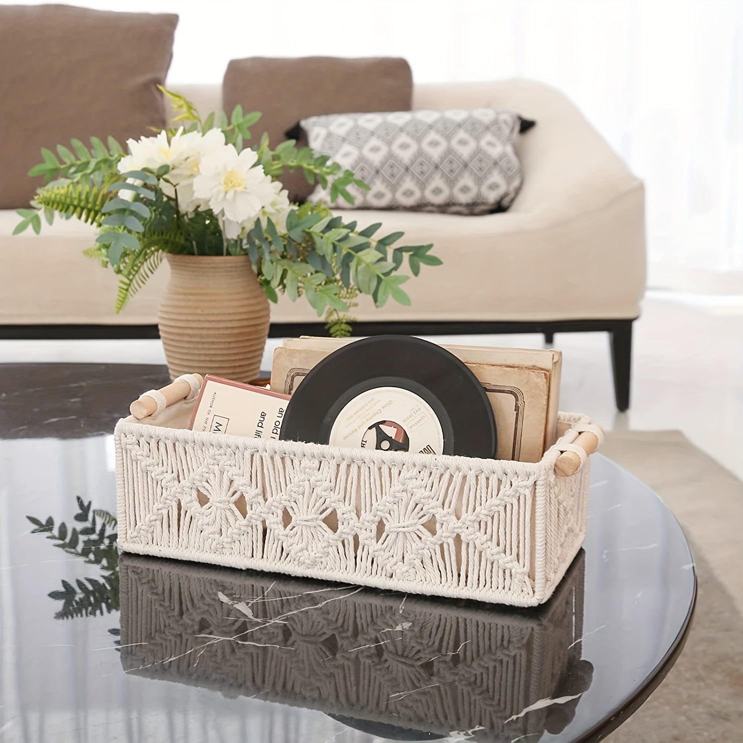 Handmade macrame storage baskets with wooden handles, perfect for organizing records and home decor