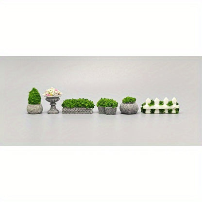 Handmade resin zen garden decor featuring tiny planters and greenery for peaceful tabletop aesthetics