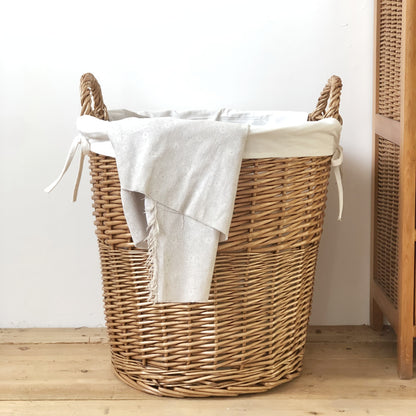 Handmade Woven Basket with a Fabric Insert, perfect for organizing and home decor.