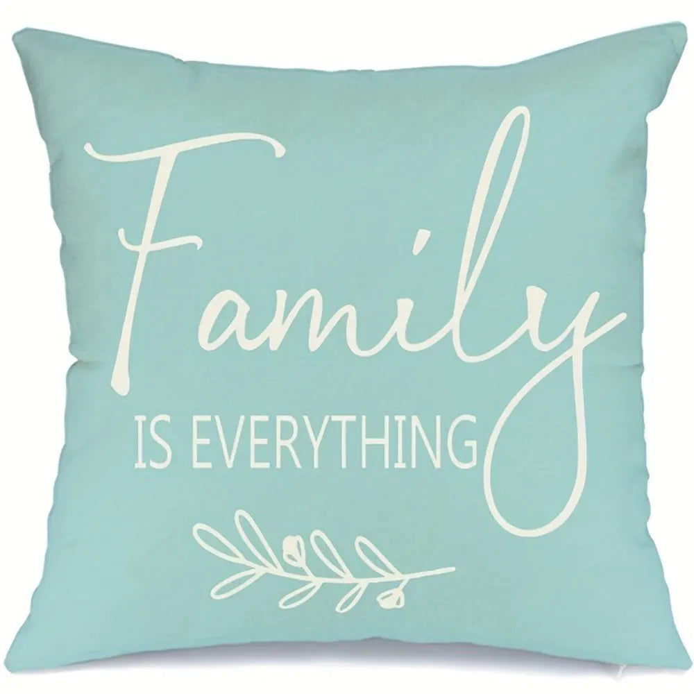 Light blue home decor cushion cover set with Family is Everything white text and leaf design